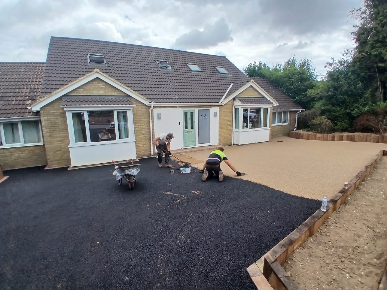 The Hertsmere team laying a resin-bound driveway